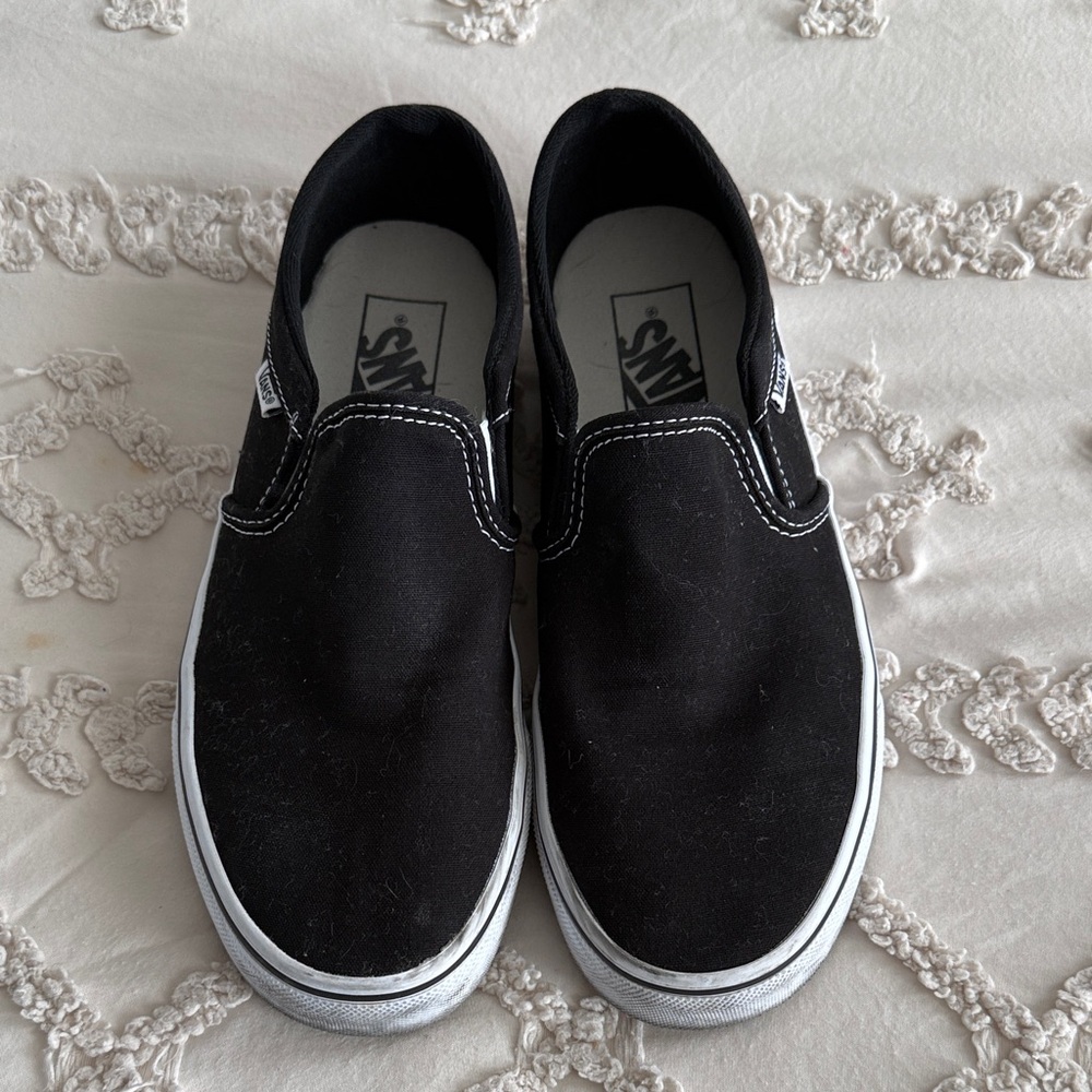 Vans Black Canvas Slip-Ons